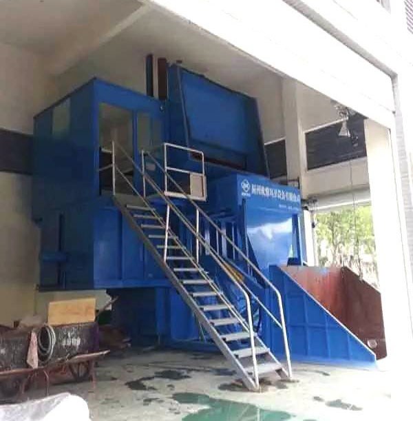 側(cè)翻式垂直壓縮垃圾站